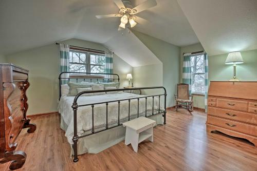 a bedroom with a bed and a ceiling fan at Lake Michigan Waterfront Home 1 Mile to Downtown! in Douglas