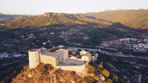 an aerial view of a castle on a mountain at Hotel Robert in La Pobla de Claramunt