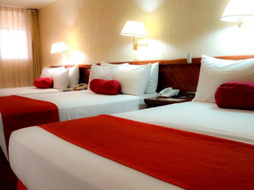 Säng eller sängar i ett rum på HOTEL BRISA Coatzacoalcos