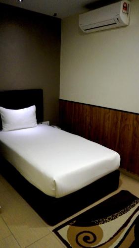 Postel nebo postele na pokoji v ubytování Be Boutique Hotel