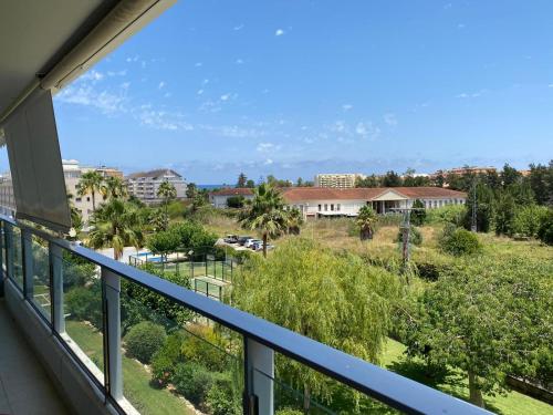 a balcony with a view of a park at Apartamento Aguamar in Denia