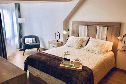Cama ou camas em um quarto em Ático nuevo en el Pirineo Aragonés Panticosa