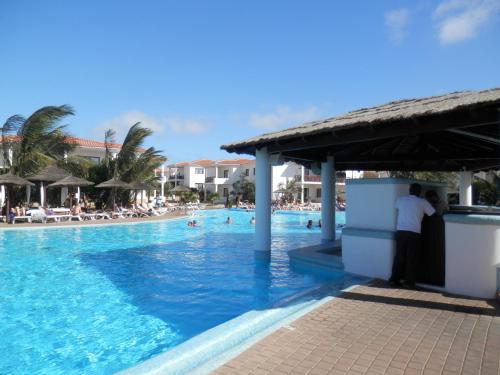 uma piscina no resort em Tortuga Beach Village Private Apartments and Villas for Rent em Santa Maria