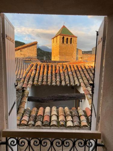 a view of a tile roof of a building at Hostel Le Diablotin in Saint-Jean-de-Fos