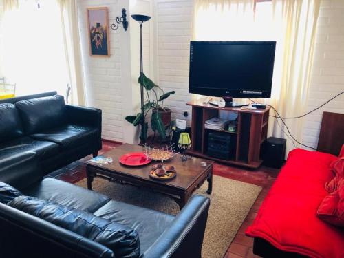 TV a/nebo společenská místnost v ubytování La Estrella del canelo