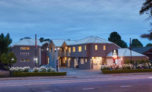 a building on the side of a street at FYFFE on Riccarton in Christchurch