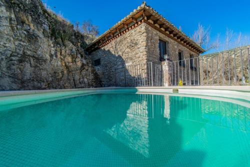 Bazén v ubytování Casa Rural Cortijo Pesquera nebo v jeho okolí