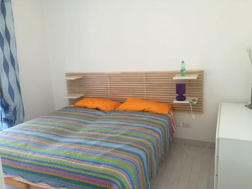 A bed or beds in a room at VILLA VISTA MARE INFINITY POOL