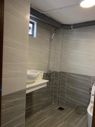 Ένα μπάνιο στο Smiley Apartment Quận 2
