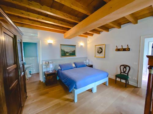 Ένα ή περισσότερα κρεβάτια σε δωμάτιο στο Casa Vittoria