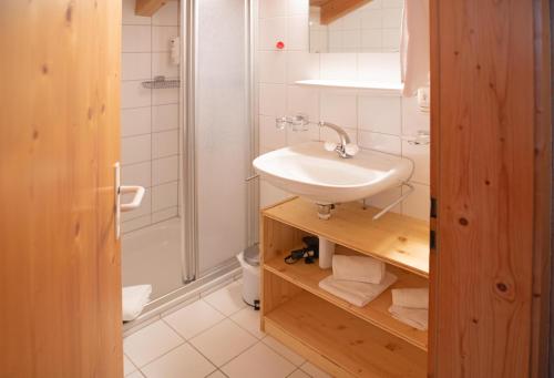 Koupelna v ubytování Hotel Bergführer