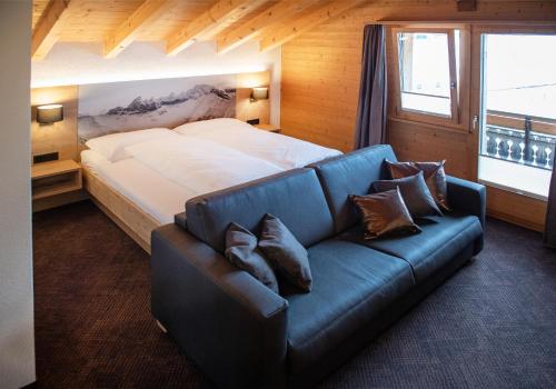 Postel nebo postele na pokoji v ubytování Hotel Bergführer