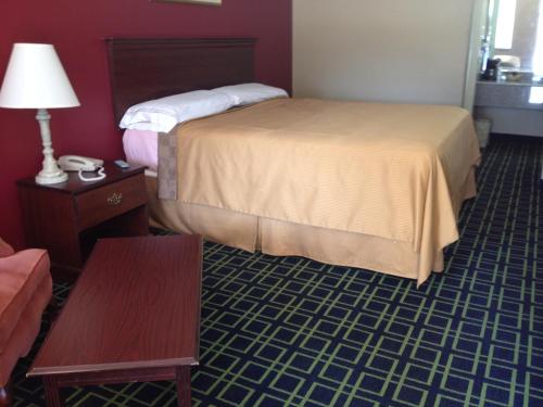 Ένα ή περισσότερα κρεβάτια σε δωμάτιο στο Motel 6-Freeport, TX