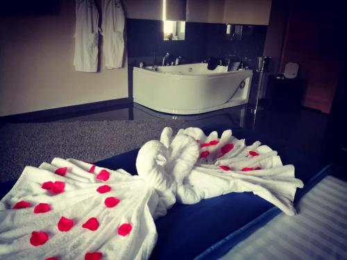 Postel nebo postele na pokoji v ubytování Hotel Elite
