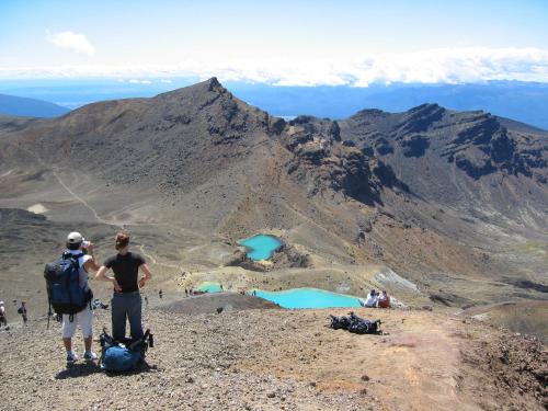 two people standing at the top of a mountain at Howard's Mountain Lodge in National Park