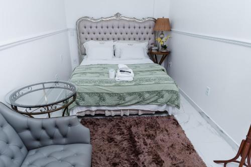 เตียงในห้องที่ ZANI APART HOTEL 520i