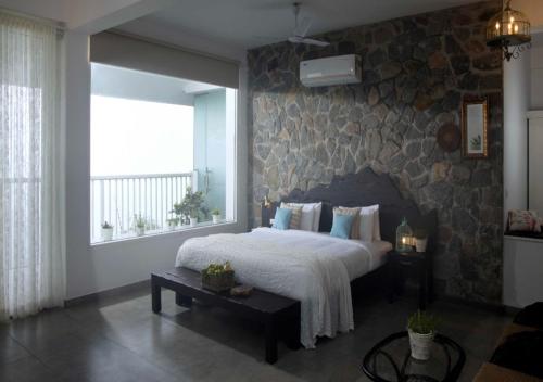 Cama o camas de una habitación en Hills & Hues