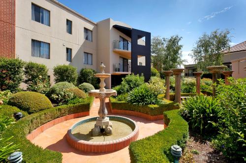 Κήπος έξω από το AAC Apartments - Griffin