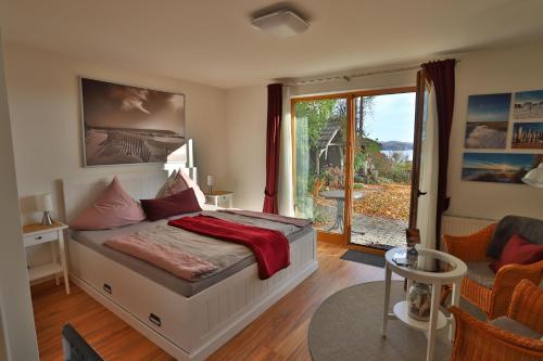 Un pat sau paturi într-o cameră la Bellevue