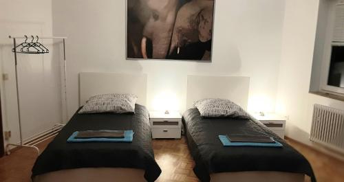 Katil atau katil-katil dalam bilik di Appartement 70qm, Zentral!