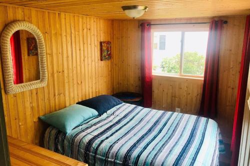 A bed or beds in a room at lovely chalet near the beach