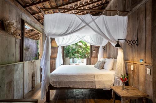 Postel nebo postele na pokoji v ubytování Casa BEE Trancoso