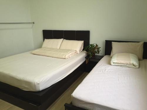 Letto o letti in una camera di Tangkak Greenville Homestay
