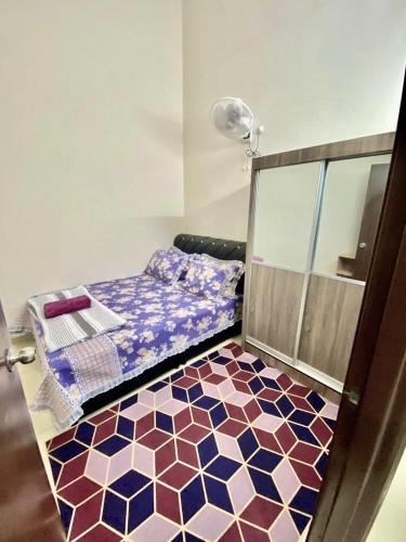 Postel nebo postele na pokoji v ubytování ST2167 Arfa Permata Homestay