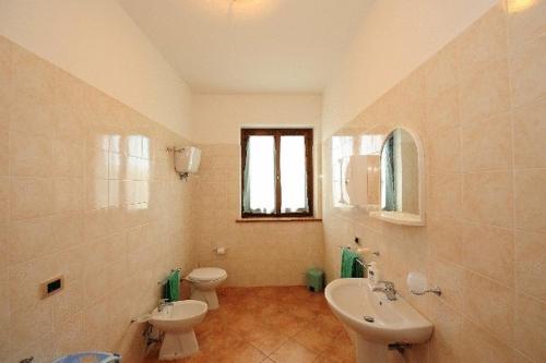 Vonios kambarys apgyvendinimo įstaigoje Agriturismo Villa Martis