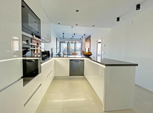 Luxury Apartment with private hot tub by Poniente Beach