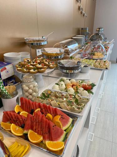 a buffet line with many different types of food at Savana Resort Mielno in Mielno