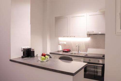 Η κουζίνα ή μικρή κουζίνα στο Zea Apartments