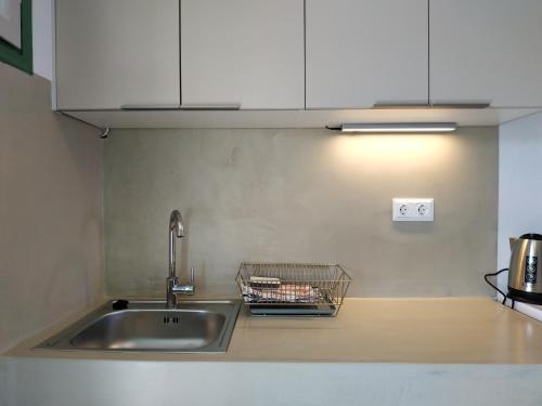 A kitchen or kitchenette at Asteri Apartments
