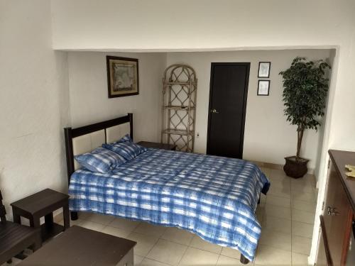 A bed or beds in a room at Depto Las Puertas de la Ria #4