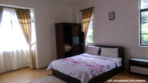 Postel nebo postele na pokoji v ubytování Ar Rayyan Apartments Prima Villa