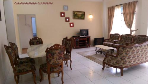 TV a/nebo společenská místnost v ubytování Ar Rayyan Apartments Prima Villa