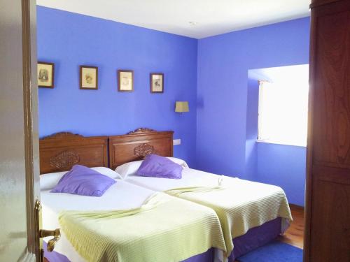 Postel nebo postele na pokoji v ubytování H Casona Selgas de Cudillero