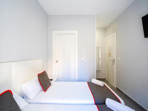 TV a/nebo společenská místnost v ubytování Hostal Jireh