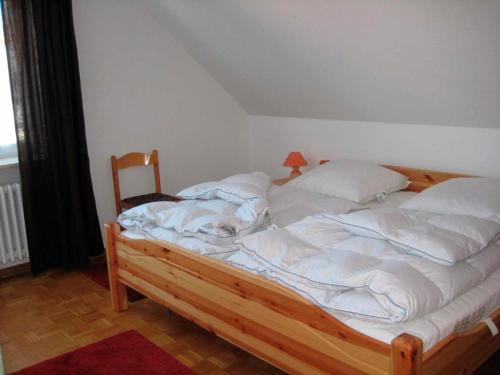 เตียงในห้องที่ Ferienwohnung Wehrend 9064 - Fehmarn