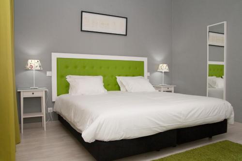 מיטה או מיטות בחדר ב-Quinta dos I's - Algarve