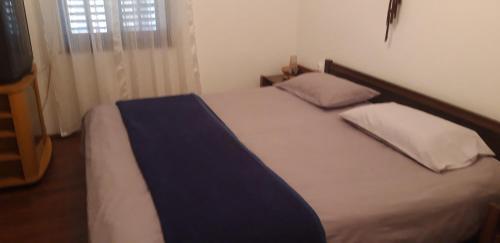 Postel nebo postele na pokoji v ubytování Apartman Anika
