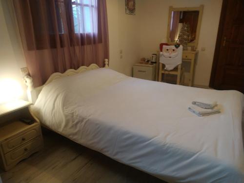 Postel nebo postele na pokoji v ubytování Traditional Cozy Room