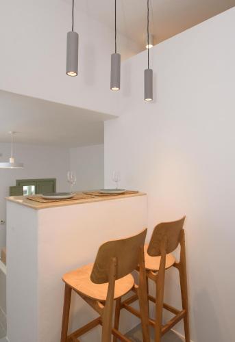Kuchyň nebo kuchyňský kout v ubytování Theasis Suites