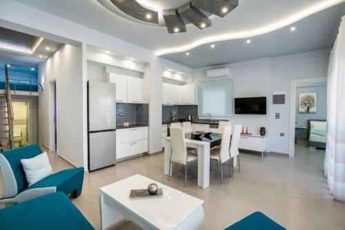 Η κουζίνα ή μικρή κουζίνα στο Isalos Apartment