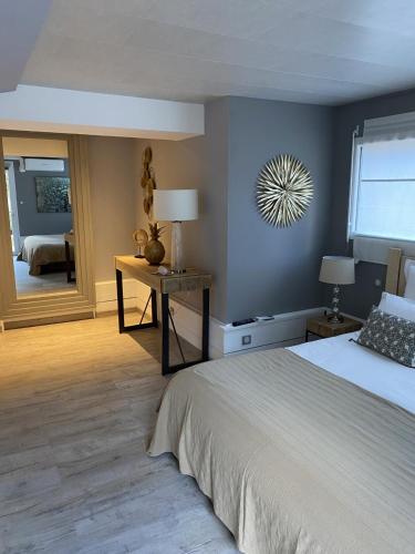 Cama o camas de una habitación en Au Gre Du Sud