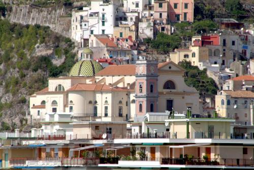 a group of buildings on a hill with a town at Casa Raffaele Conforti in Maiori