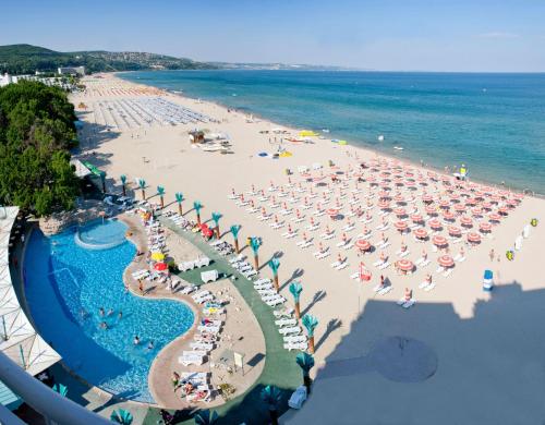 an overhead view of a beach with people and umbrellas at Hotel Boryana in Albena