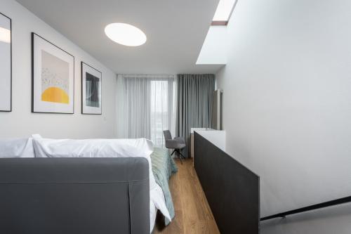 Posteľ alebo postele v izbe v ubytovaní Fully renovated stylish duplex in a convenient location