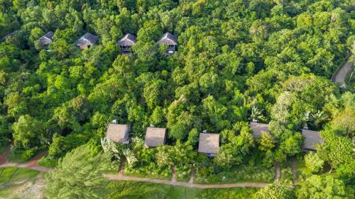 an aerial view of a village in the forest at Mango Bay Resort in Phú Quốc
