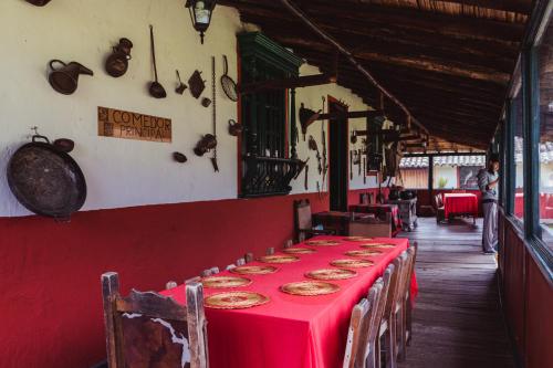 En restaurang eller annat matställe på Hotel y Centro de Convenciones Pueblito de Yerbabuena Paraíso Natural